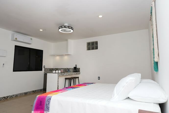 Imagen de la habitación del Hotel Linda Vecindad Playa del Carmen. Foto 13