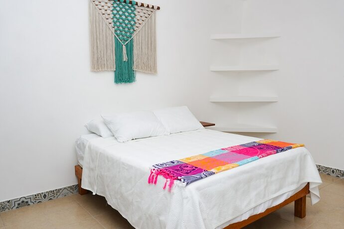 Imagen de la habitación del Hotel Linda Vecindad Playa del Carmen. Foto 16