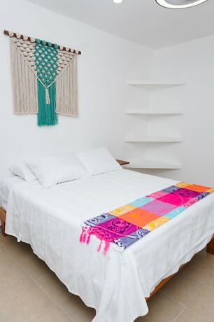 Imagen de la habitación del Hotel Linda Vecindad Playa del Carmen. Foto 19