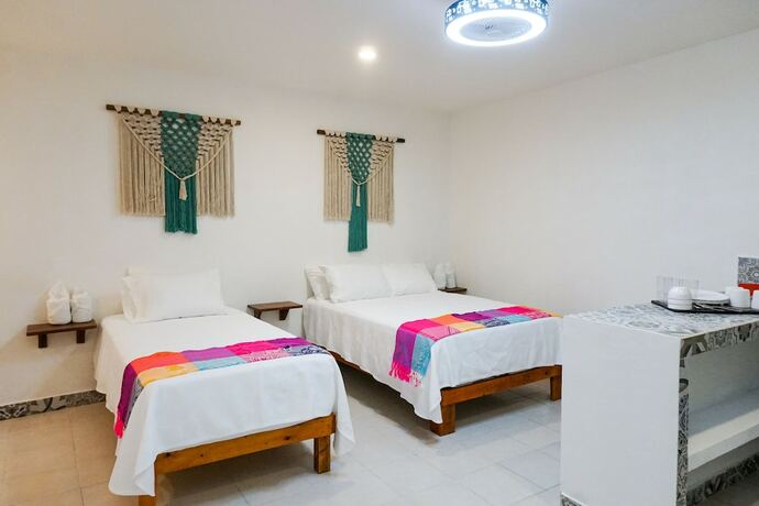 Imagen de la habitación del Hotel Linda Vecindad Playa del Carmen. Foto 20