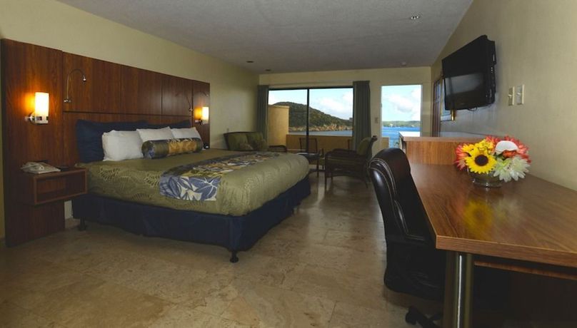 Imagen de la habitación del Hotel Lindbergh Bay and Villas. Foto 5
