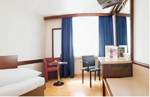 Imagen de la habitación del Hotel Linde, BADEN. Foto 10