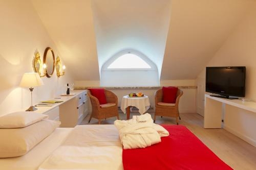 Imagen de la habitación del Hotel Linde. Foto 8