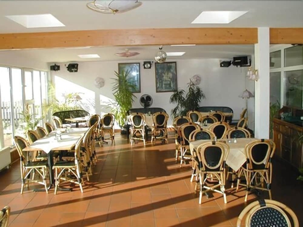 Imagen del bar/restaurante del Hotel Lindenberger Hof, Ahrensfelde. Foto 3