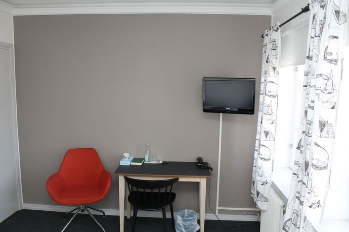 Imagen de la habitación del Hotel Lindesbergs Stadshotell. Foto 17