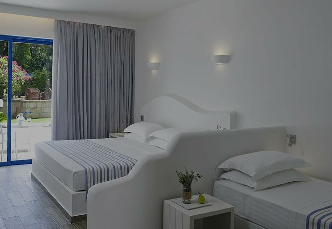 Imagen de la habitación del Hotel Lindia Thalassa Resort. Foto 19