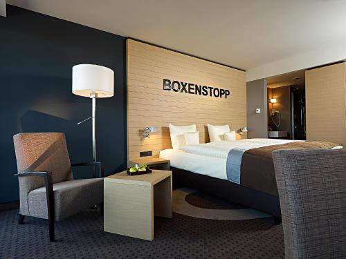 Imagen de la habitación del Hotel Lindner Eifeldorf Gr&uuml;ne H&ouml;lle N&uuml;rburgring. Foto 6