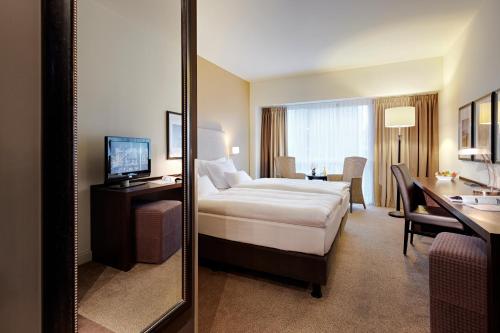 Imagen de la habitación del Hotel Lindner Hotel Antwerp, part of JdV by Hyatt. Foto 13