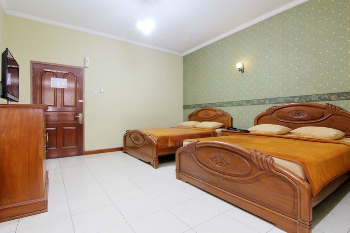 Imagen de la habitación del Hotel Lingga Hotel. Foto 9