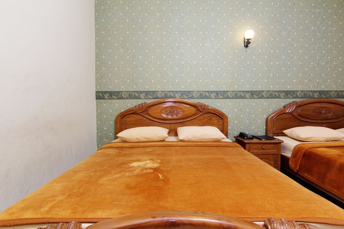 Imagen de la habitación del Hotel Lingga Hotel. Foto 11