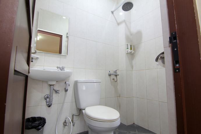 Imagen de la habitación del Hotel Lingga Hotel. Foto 13