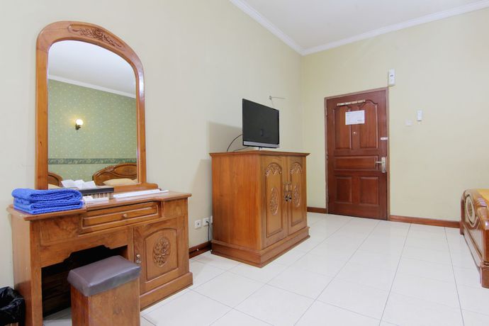 Imagen de la habitación del Hotel Lingga Hotel. Foto 14