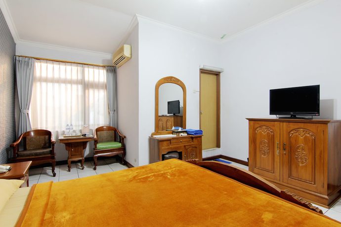 Imagen de la habitación del Hotel Lingga Hotel. Foto 16