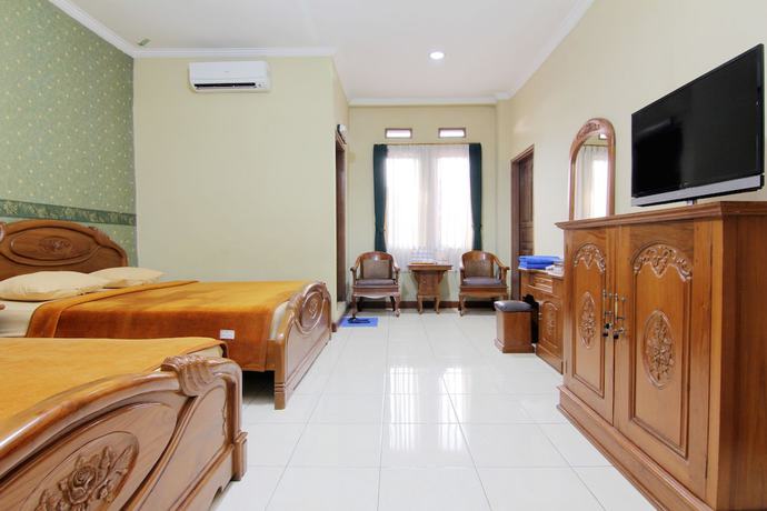 Imagen de la habitación del Hotel Lingga Hotel. Foto 18