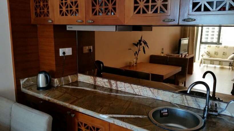 Imagen de la habitación del Hotel Lingshui Sea View Vacation Apartment. Foto 12