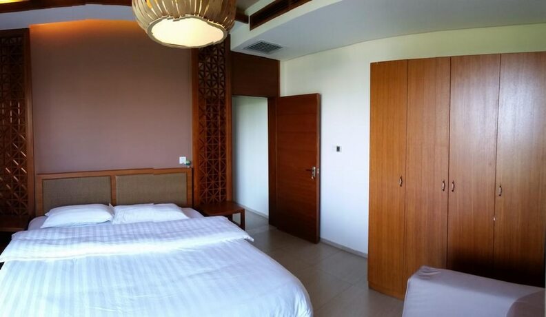 Imagen de la habitación del Hotel Lingshui Sea View Vacation Apartment. Foto 15