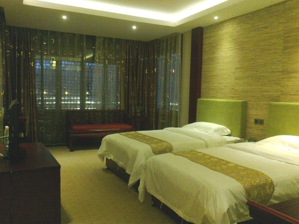 Imagen de la habitación del Hotel Lingxiu Impression Hotel. Foto 2