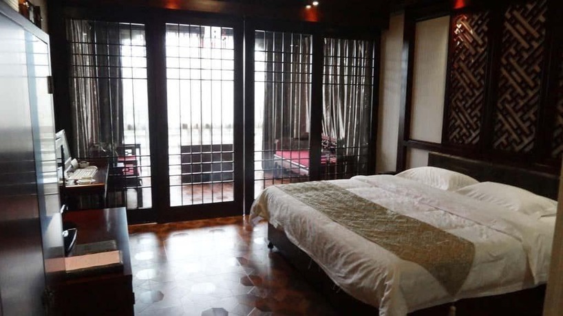 Imagen de la habitación del Hotel Lingxiu Impression Hotel. Foto 3