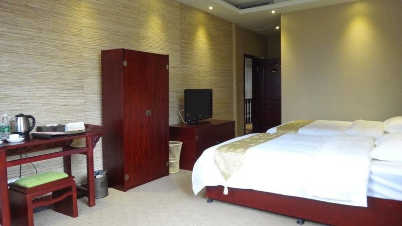 Imagen de la habitación del Hotel Lingxiu Impression Hotel. Foto 5