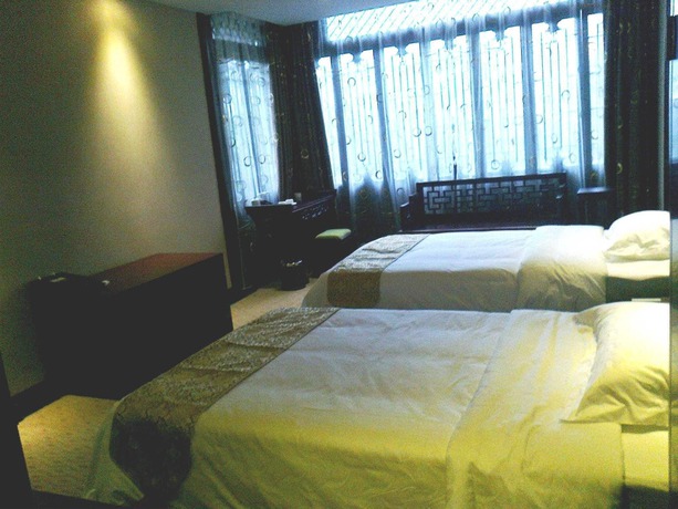 Imagen de la habitación del Hotel Lingxiu Impression Hotel. Foto 6