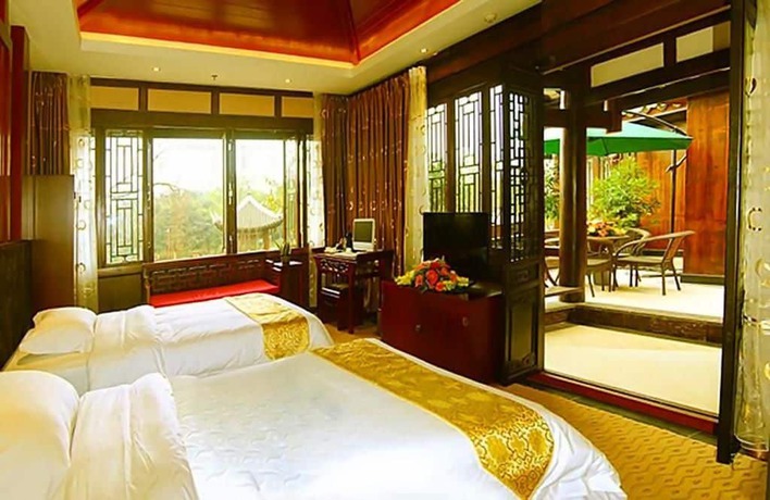 Imagen de la habitación del Hotel Lingxiu Impression Hotel. Foto 7