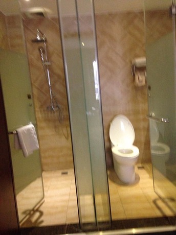 Imagen de la habitación del Hotel Lingxiu Impression Hotel. Foto 10