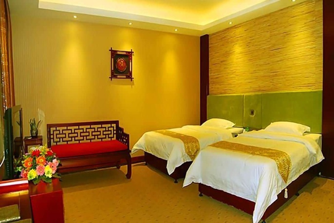 Imagen de la habitación del Hotel Lingxiu Impression Hotel. Foto 11