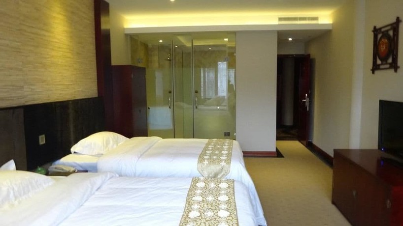 Imagen de la habitación del Hotel Lingxiu Impression Hotel. Foto 13