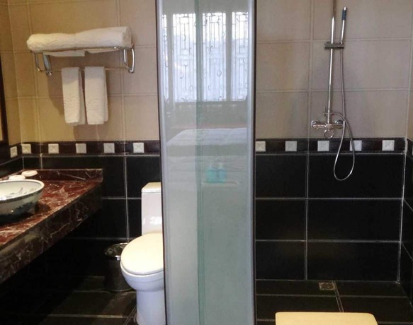 Imagen de la habitación del Hotel Lingxiu Impression Hotel. Foto 15