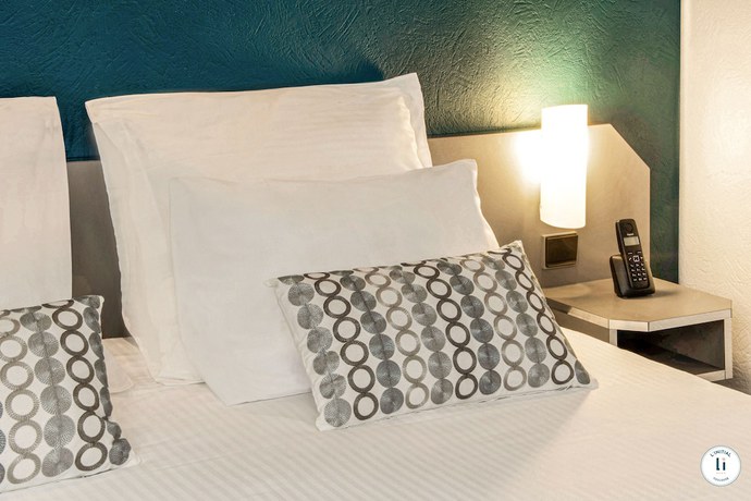 Imagen de la habitación del Hotel L'initial. Foto 8