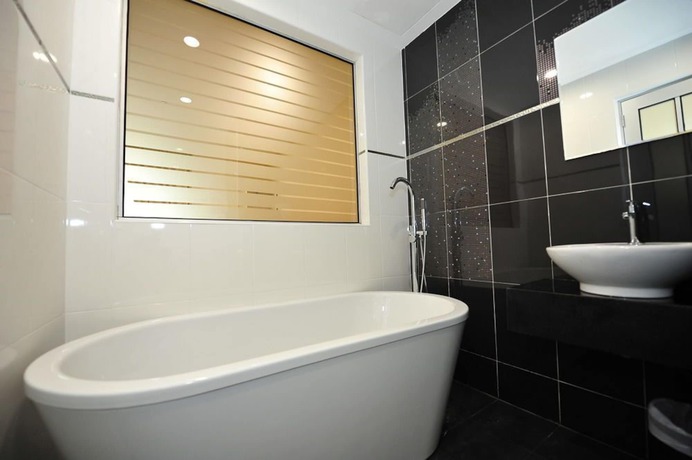 Imagen de la habitación del Hotel Link Boutique. Foto 16