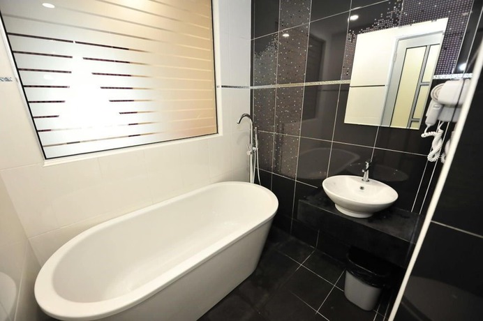 Imagen de la habitación del Hotel Link Boutique. Foto 17