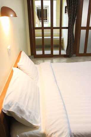 Imagen de la habitación del Hotel Link Mansion. Foto 17