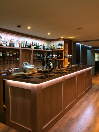 Imagen del bar/restaurante del Hotel Links Lets. Foto 2