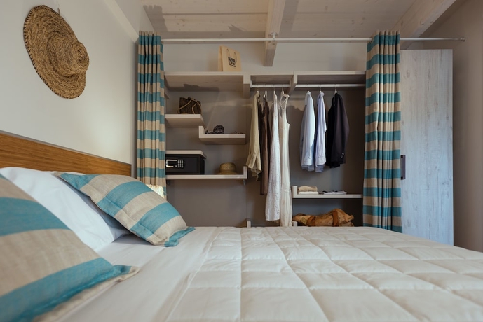Imagen de la habitación del Hotel Lino Delle Fate Eco Village Resort. Foto 5