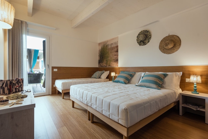 Imagen de la habitación del Hotel Lino Delle Fate Eco Village Resort. Foto 6