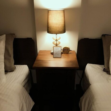 Imagen de la habitación del Hotel Lin's Inn. Foto 28