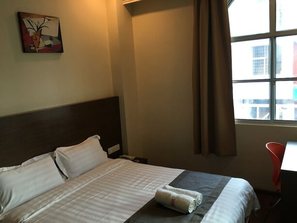 Imagen de la habitación del Hotel Lintas Plaza. Foto 15