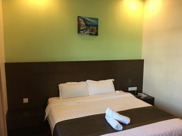 Imagen de la habitación del Hotel Lintas Plaza. Foto 16