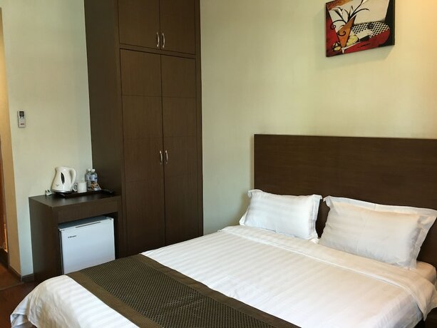 Imagen de la habitación del Hotel Lintas Plaza. Foto 19