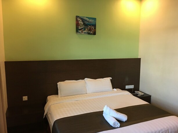 Imagen de la habitación del Hotel Lintas Plaza. Foto 21