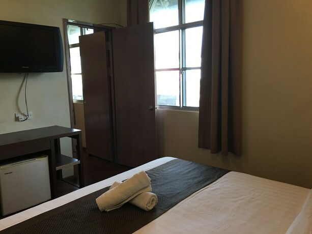 Imagen de la habitación del Hotel Lintas Plaza. Foto 22