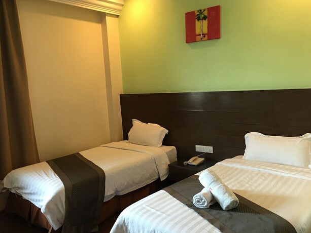 Imagen de la habitación del Hotel Lintas Plaza. Foto 26