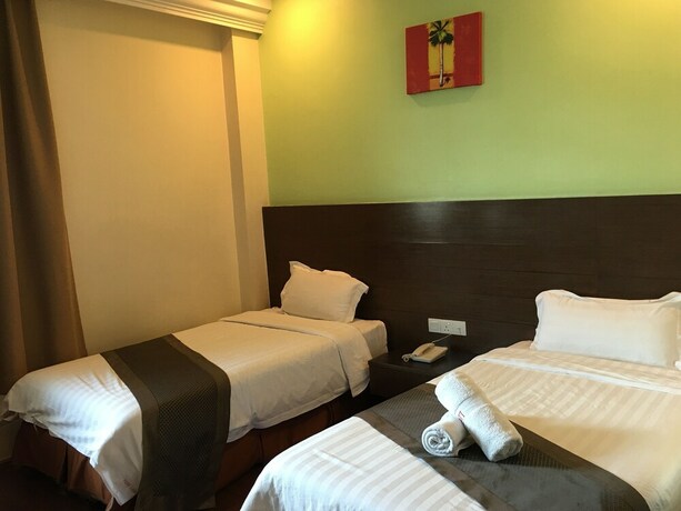 Imagen de la habitación del Hotel Lintas Plaza. Foto 31