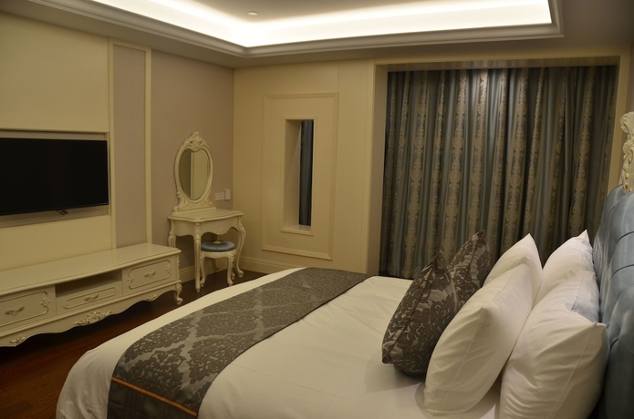 Imagen de la habitación del Hotel Linyi Damei Grand New Century Hotel. Foto 2