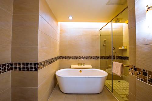 Imagen de la habitación del Hotel Linyin Holiday. Foto 1