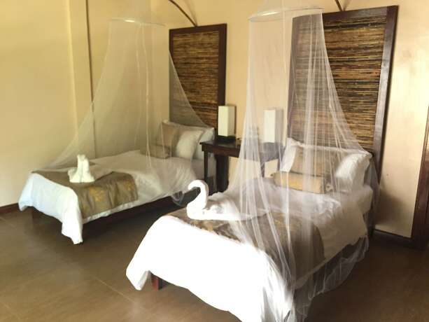 Imagen de la habitación del Hotel Lio Villas Resort. Foto 39