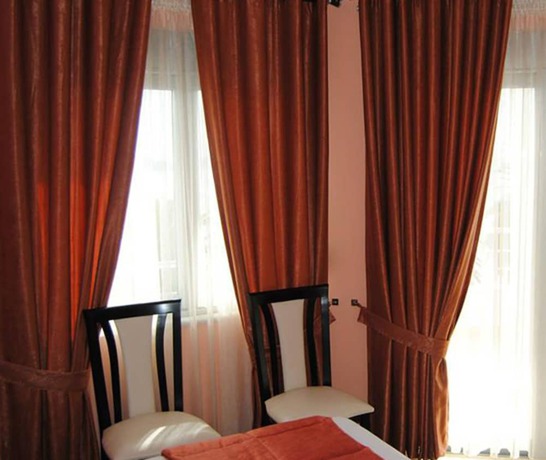 Imagen de la habitación del Hotel Lion Gate. Foto 5
