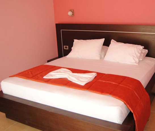 Imagen de la habitación del Hotel Lion Gate. Foto 6