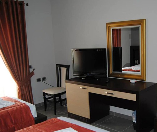 Imagen de la habitación del Hotel Lion Gate. Foto 7